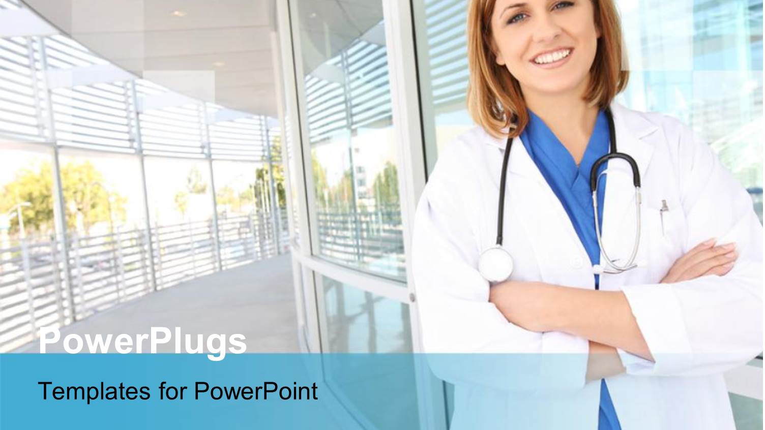 a Pretty Smiling Female Doctor Standing in a Hospital Hallway