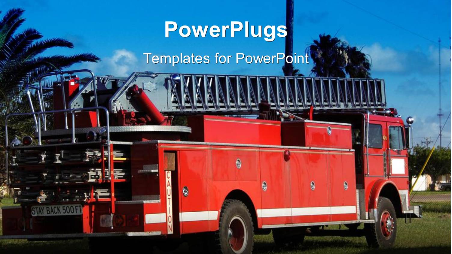 Red Fire Truck with Ladder Parked on Grass with Blue Sky