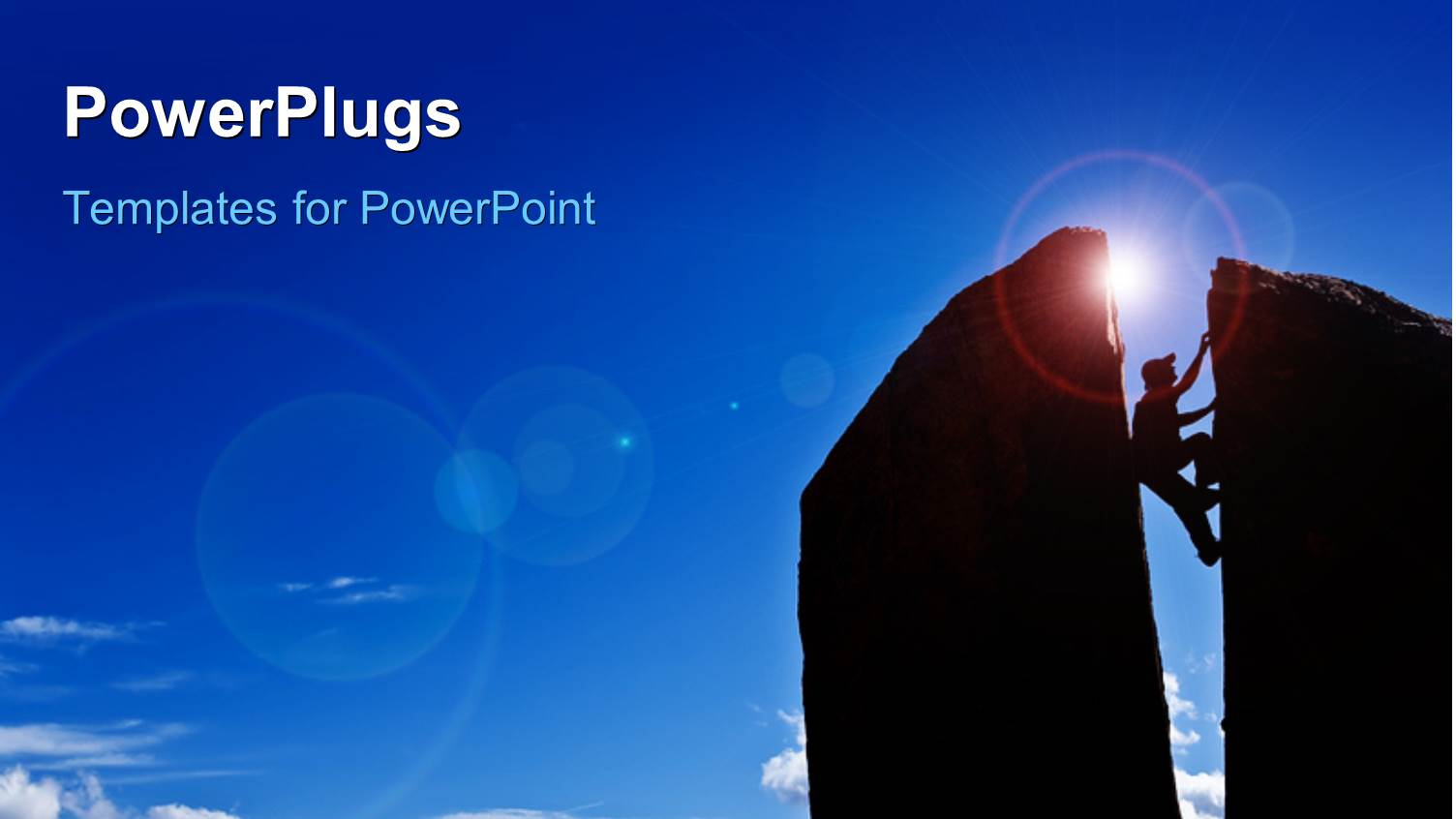 Rock Climber Squeezes his Body Between a Gap in the Summit of a Split Spire with Lens Flare