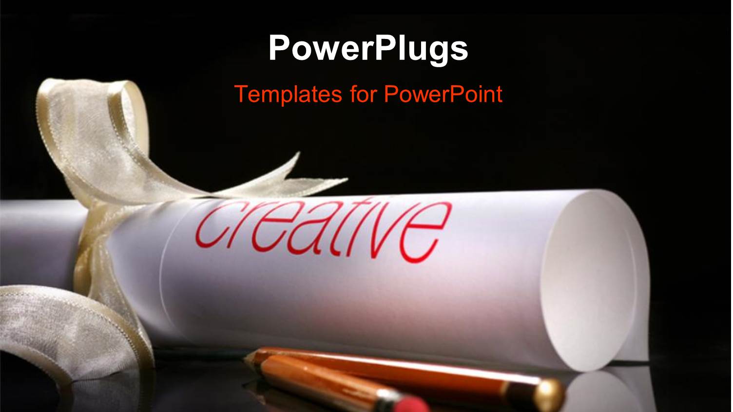 Rolled Piece of Paper Tied with Gold Ribbons and Pencils