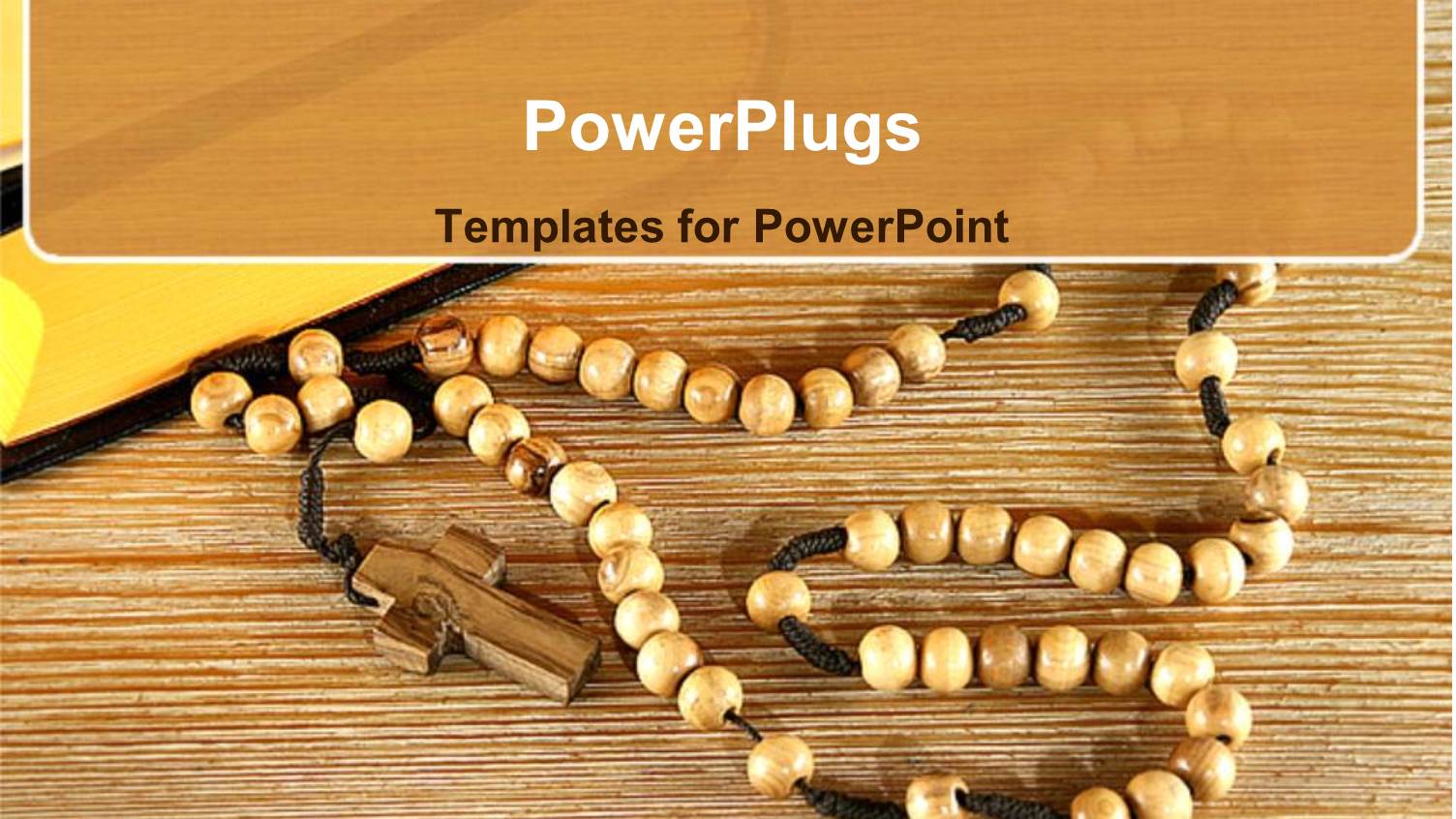 Rosary with Brown Beads and Wooden Cross Beside Holy Book