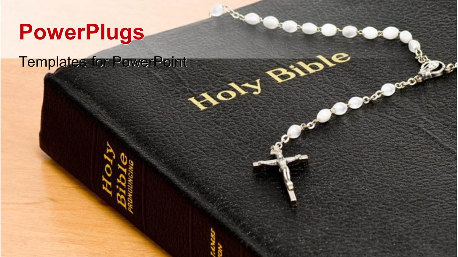Rosary on Holy Bible Sitting on Wooden Table