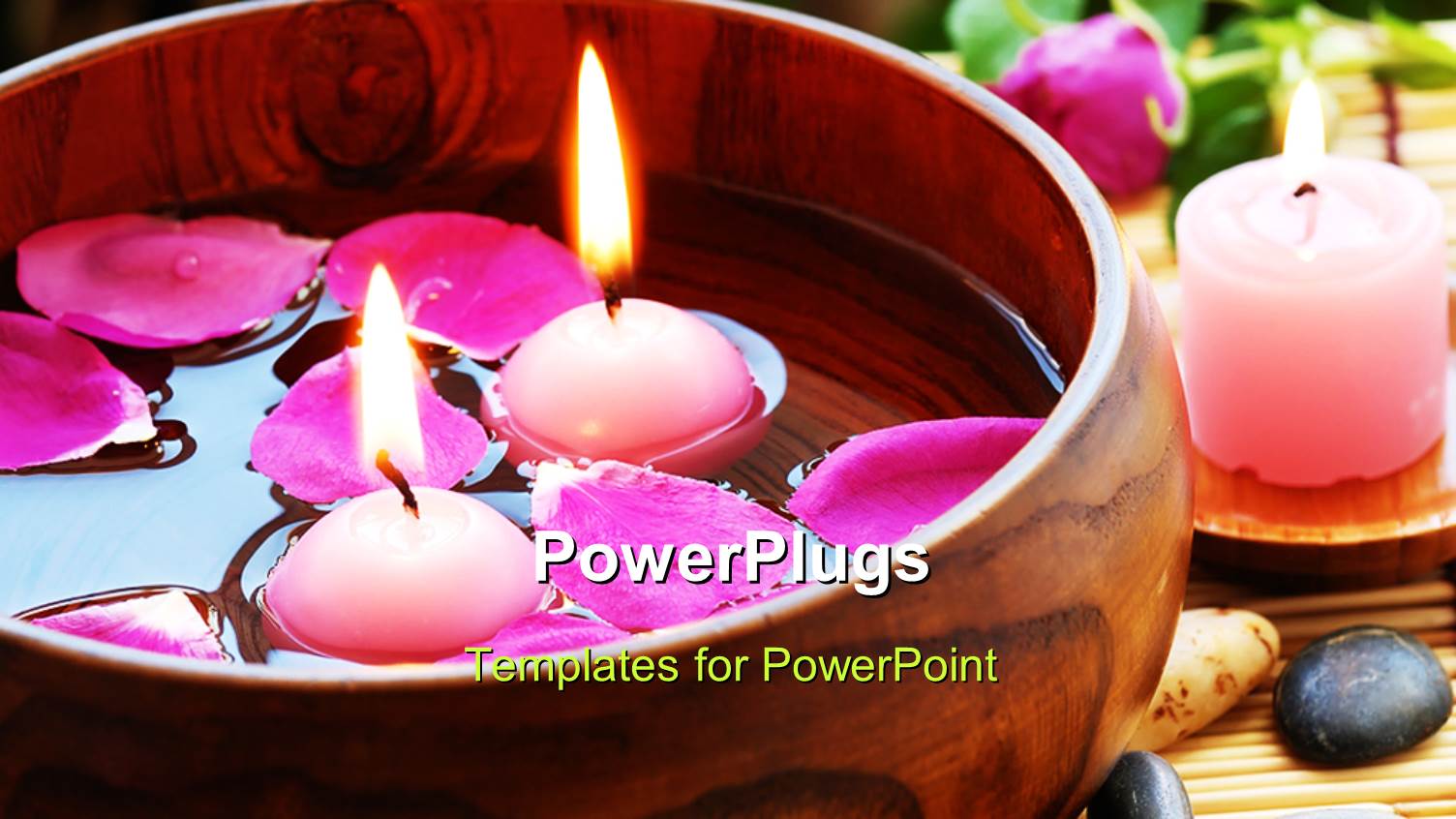 Rose Petal Aromatherapy in Wooden Bowl Next to Pink Lighted Candles
