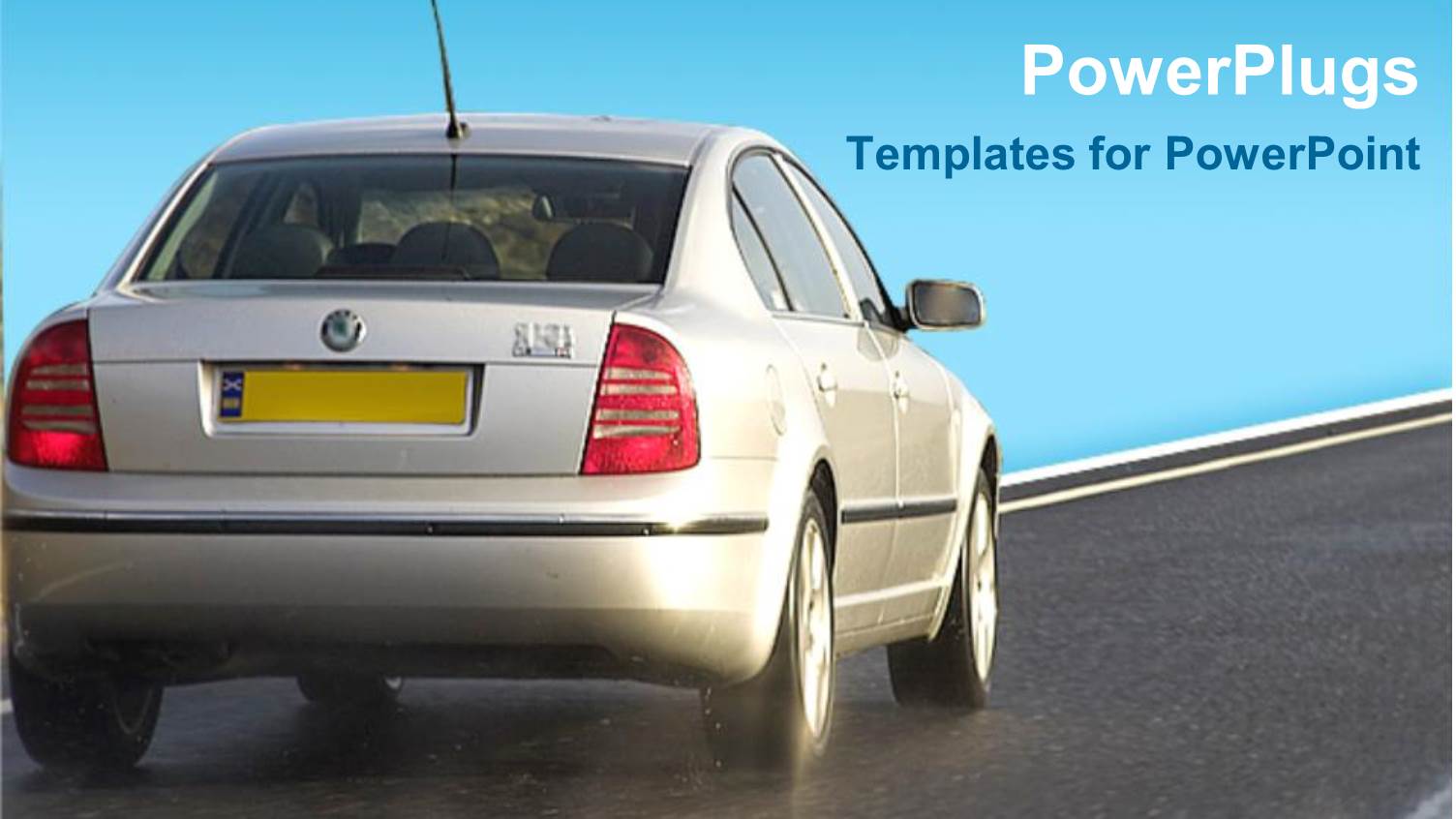 Silver Salon Car with Yellow Plates Travelling on Clean Road