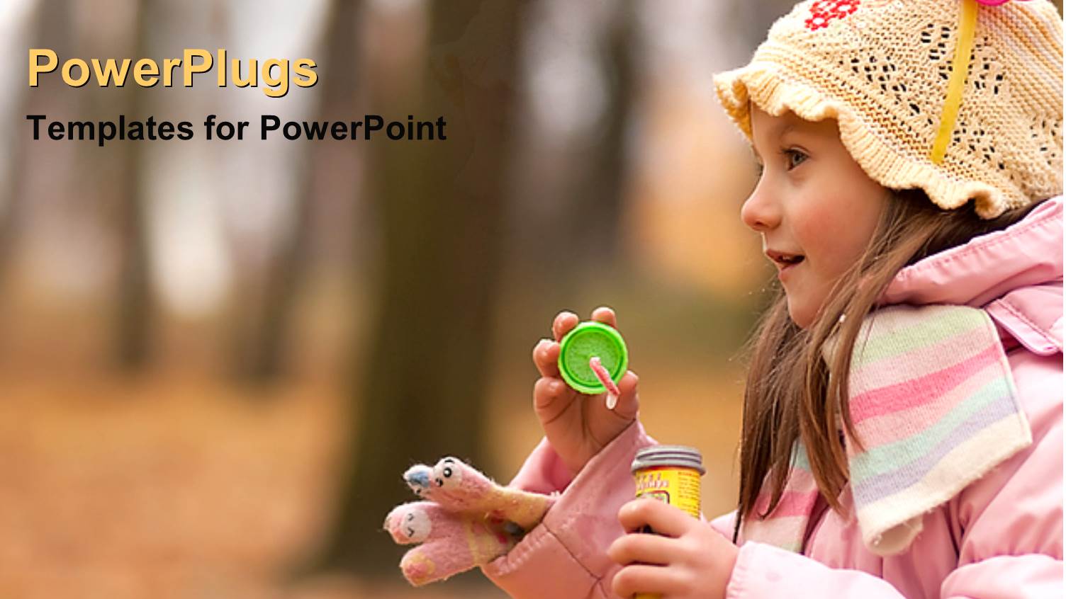 a small Girl in Pink on a Blurry Tree Background