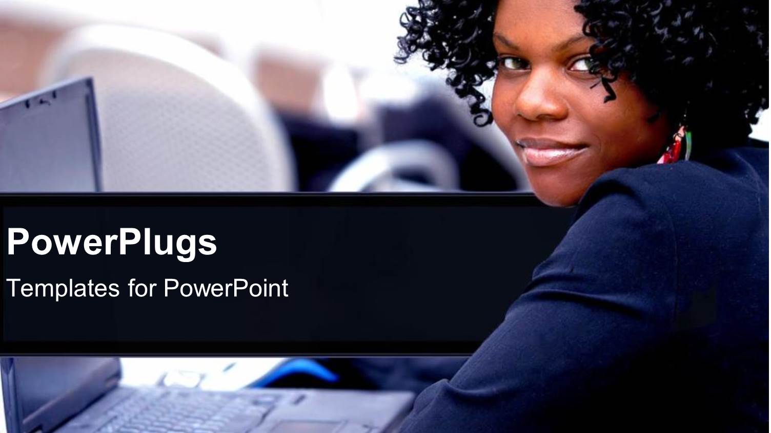 Smiling Female with an Open Laptop in Front of her