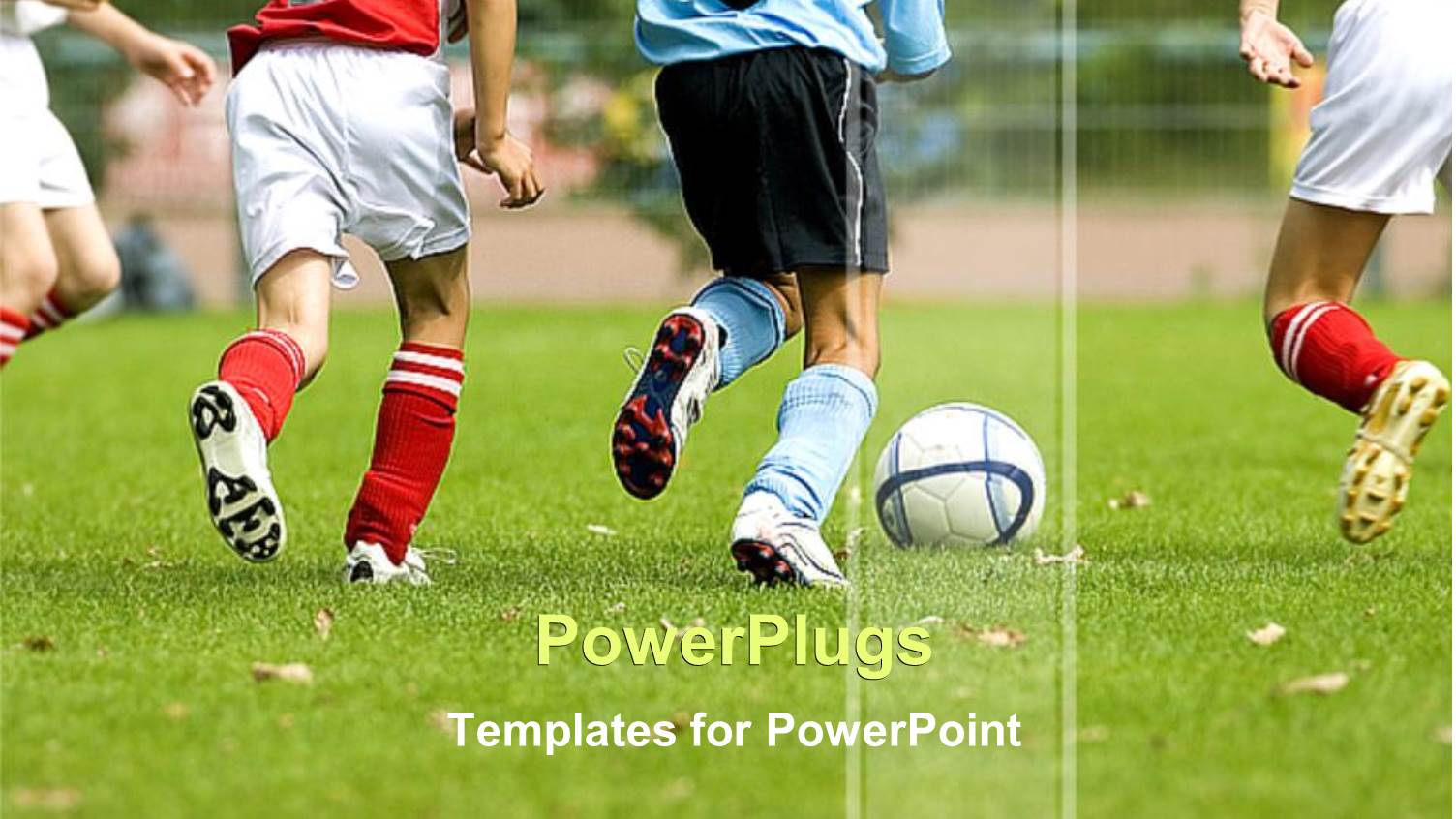 Soccer Players in Action on Grassy Field