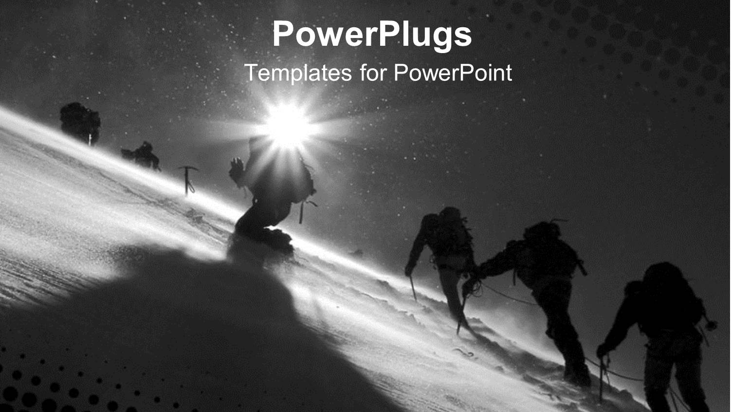 Sun Shining on Figures Climbing Snowy Mountain