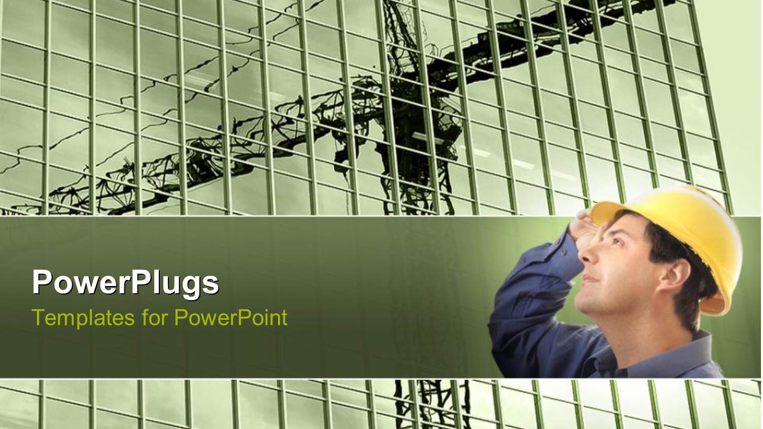 a Tall Sky Scrapper with a Construction Worker Standing in Front