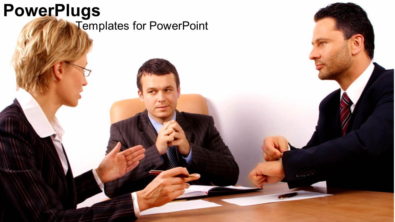 Three Adult Humans in Black Suites Having a Meeting