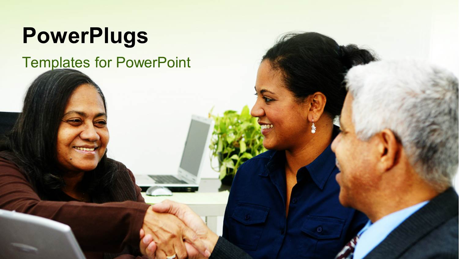 Three Matured Business People Having a Meeting and Shaking Hands