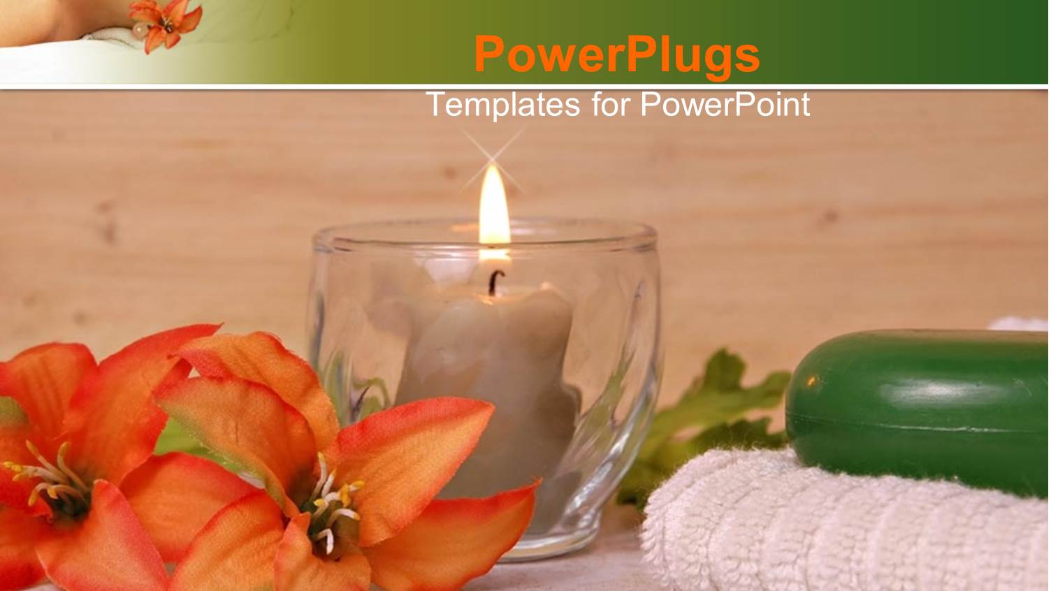 Towel Flower Candle Beside a Glass Cup with a Candle