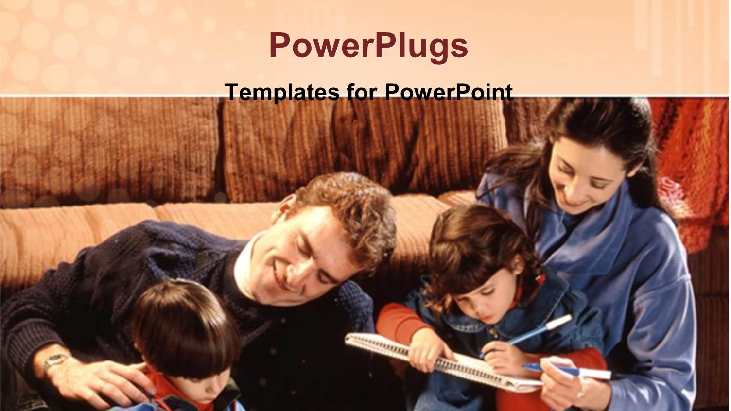 Two Adults and Two Children Lying on a Sofa