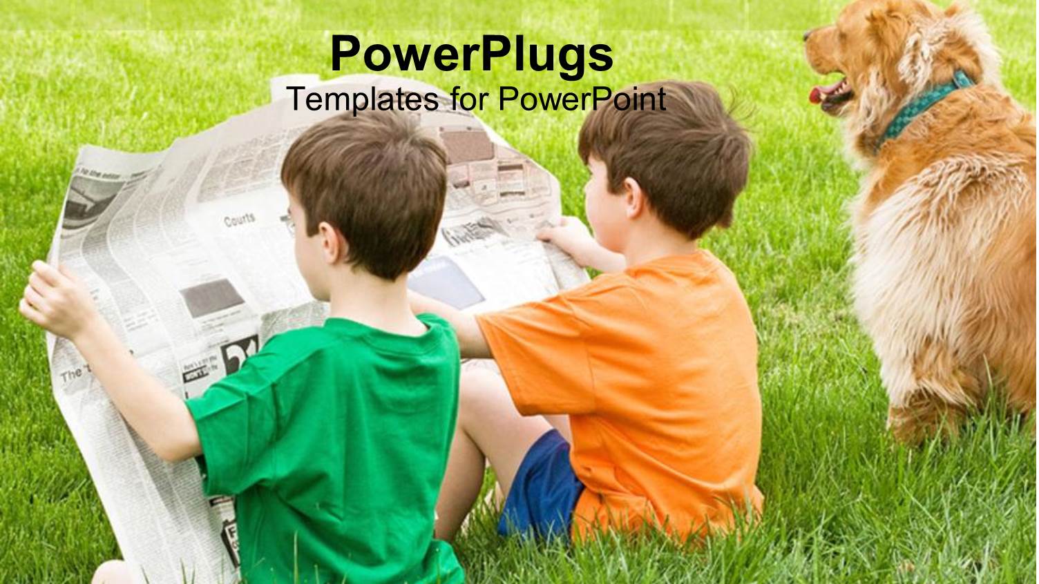 Two Boys Sitting in the Grass Reading a Newspaper Together with their Dog