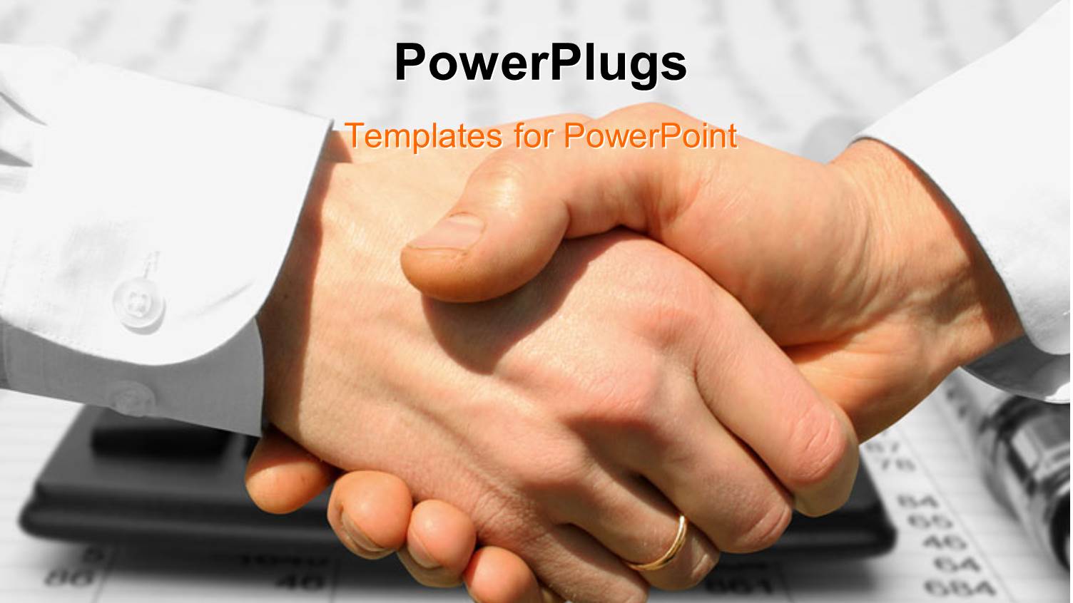 Two Business Men Having a Handshake with a Laptop Behind them 