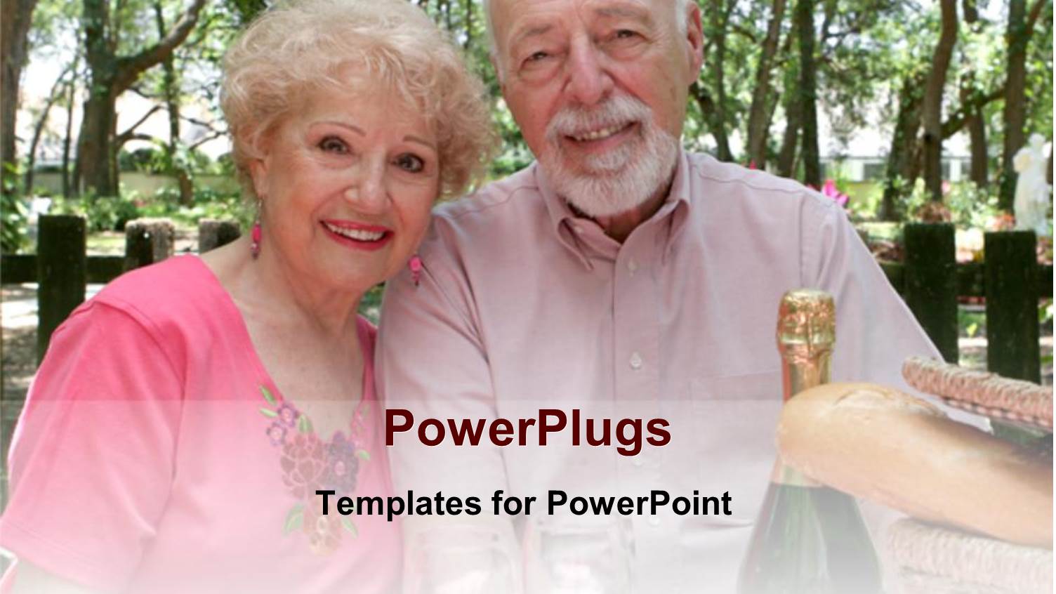 Two Elderly Humans Smiling with a Champagne Bottle Beside them