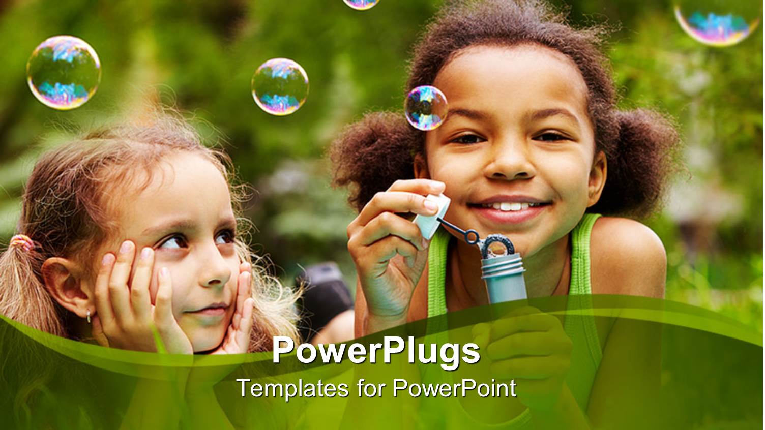 Two Female Kids Blowing Bubbles on a Green Background