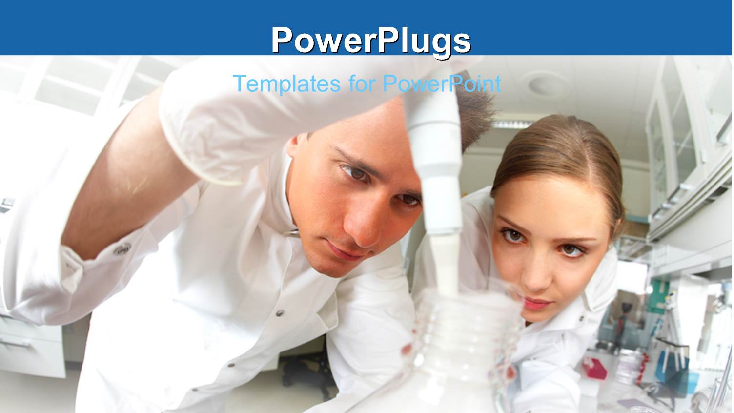 Two Scientists in White Conducting Research in a Research Laboratory