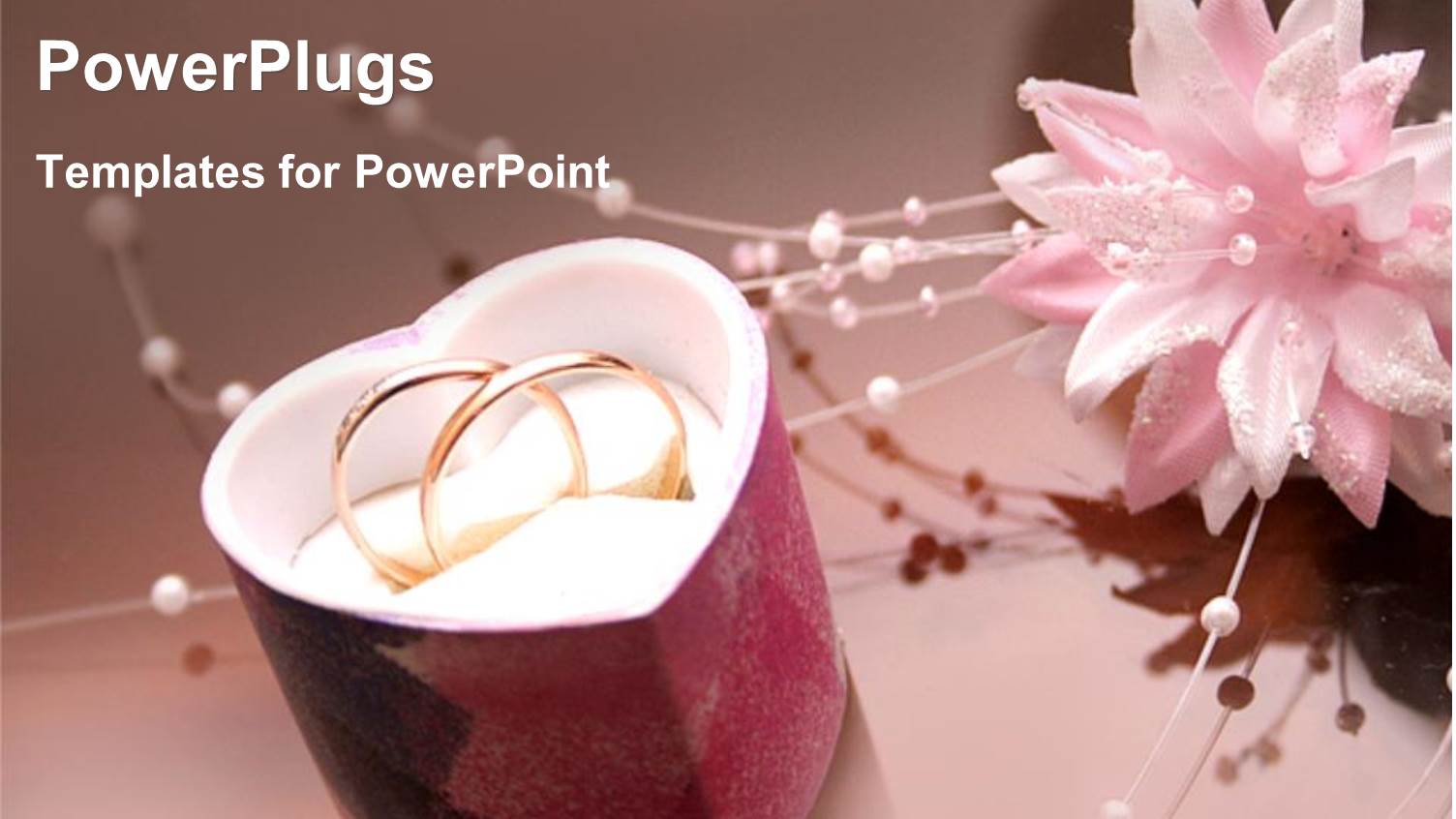 Two Wedding Rings in a Heart Shaped Jewelry Gift Box with Wedding Flower