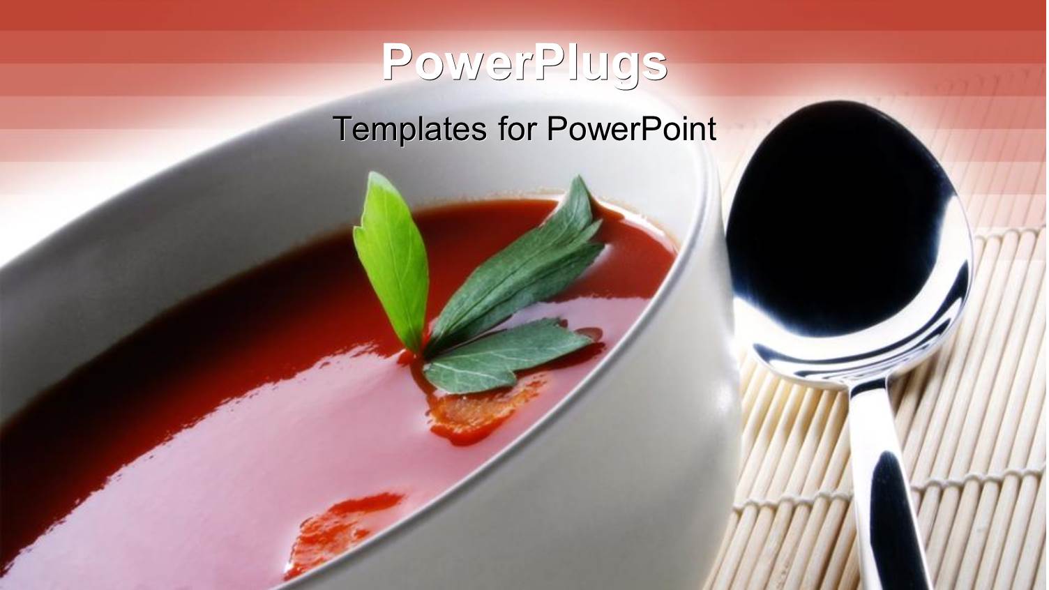 White Bowl with Hot Tomato Soup Next to Spoon on Mat