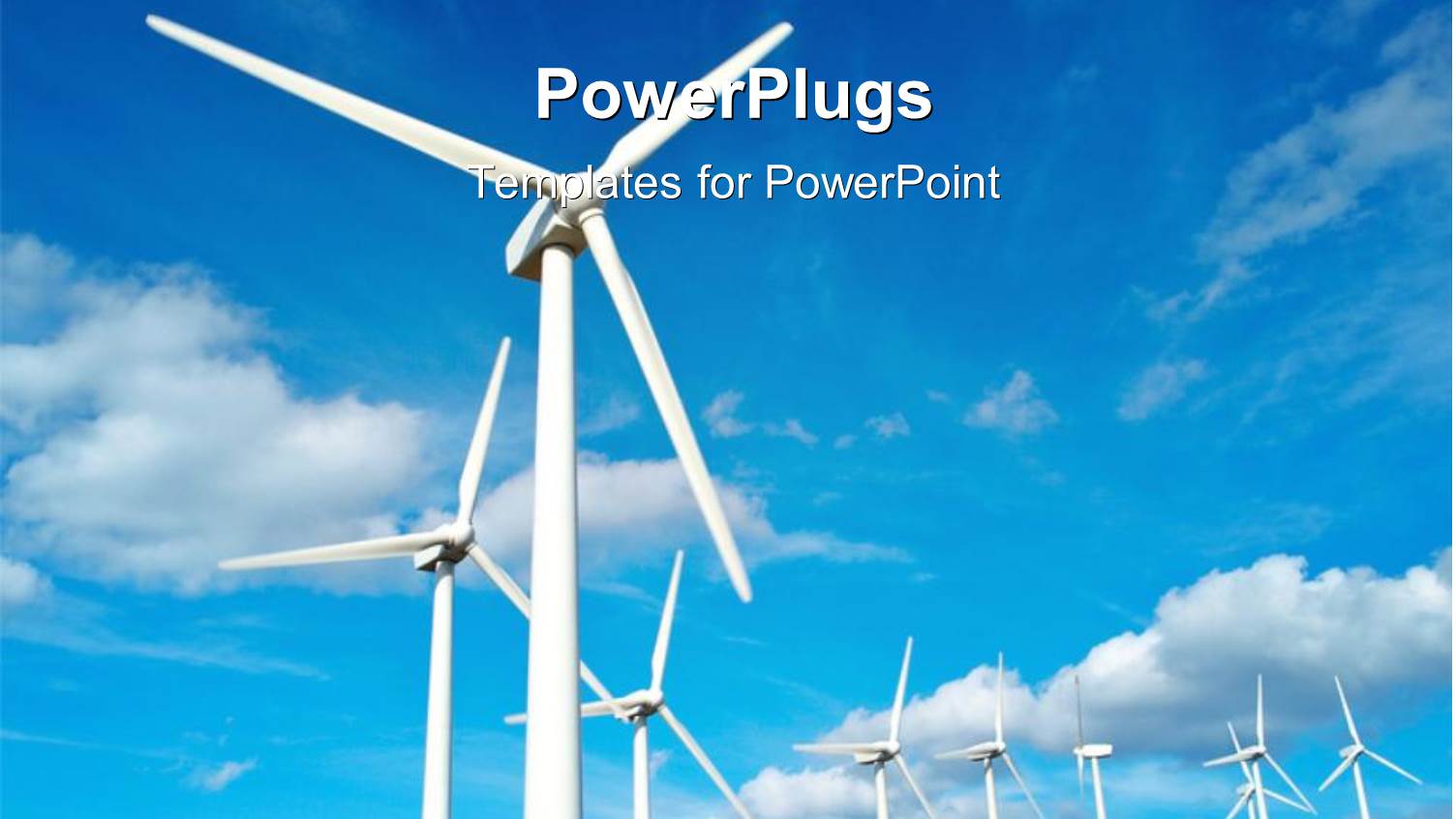 White Wind Turbines in Field with Blue Cloudy Sky