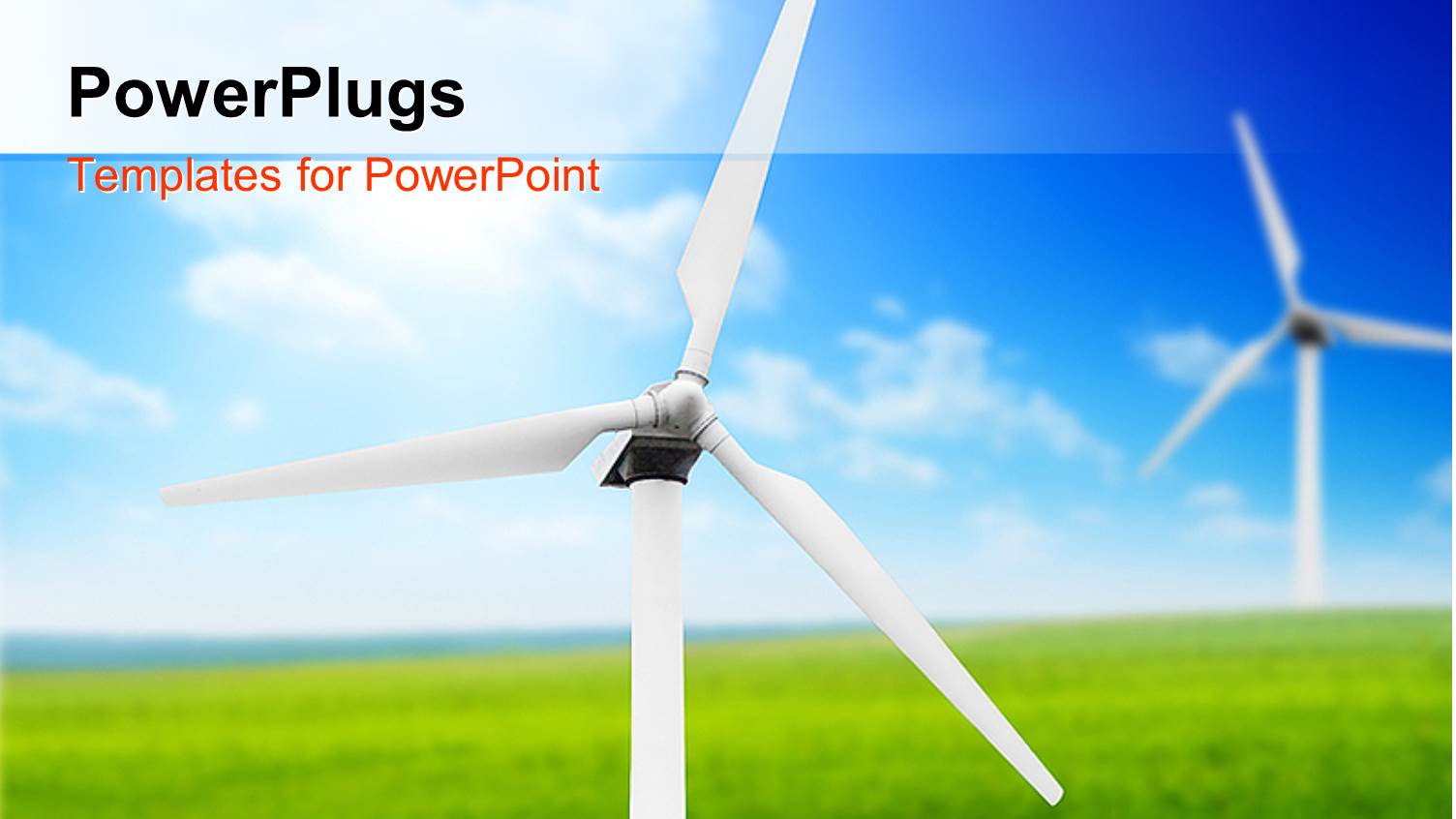 Windmills in large Green Field with Blue Cloudy Sky in Background 