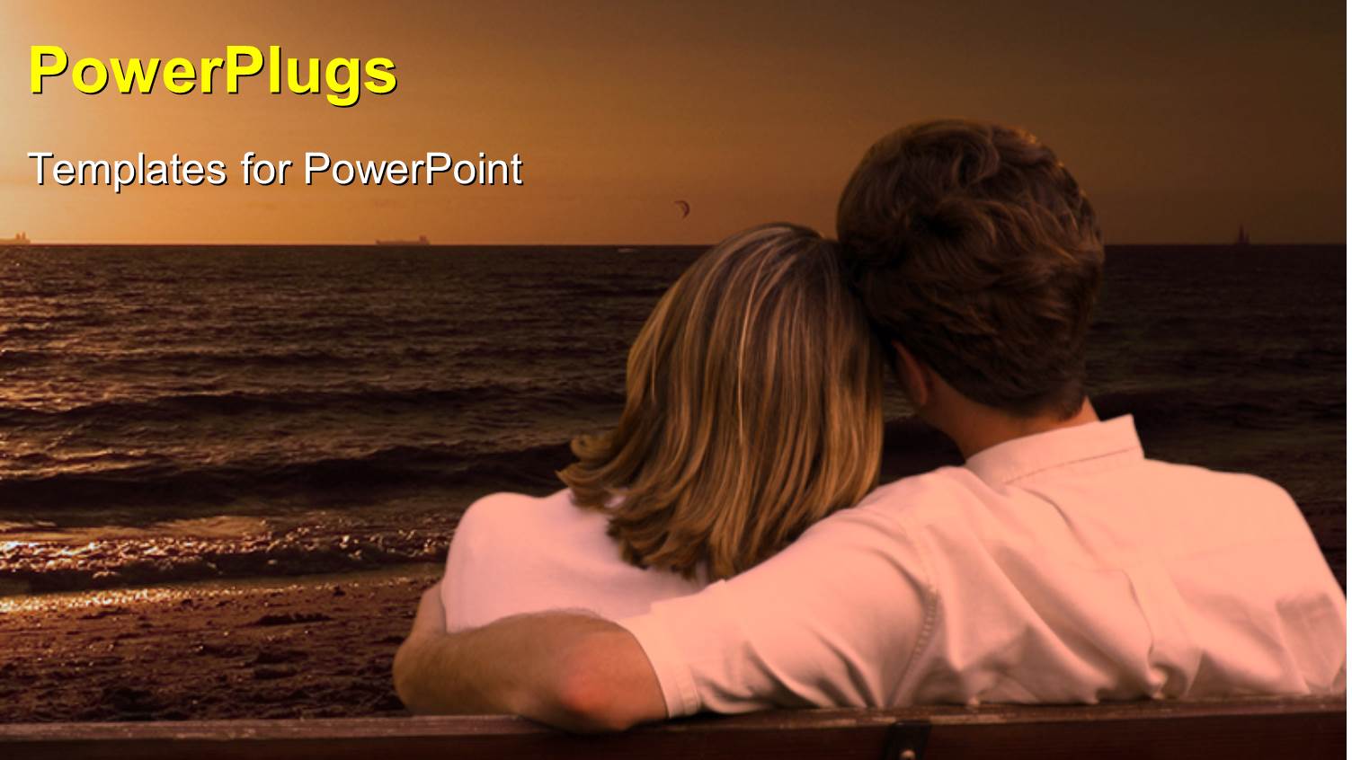 a and a Woman Sitting Together Staring at the Sea