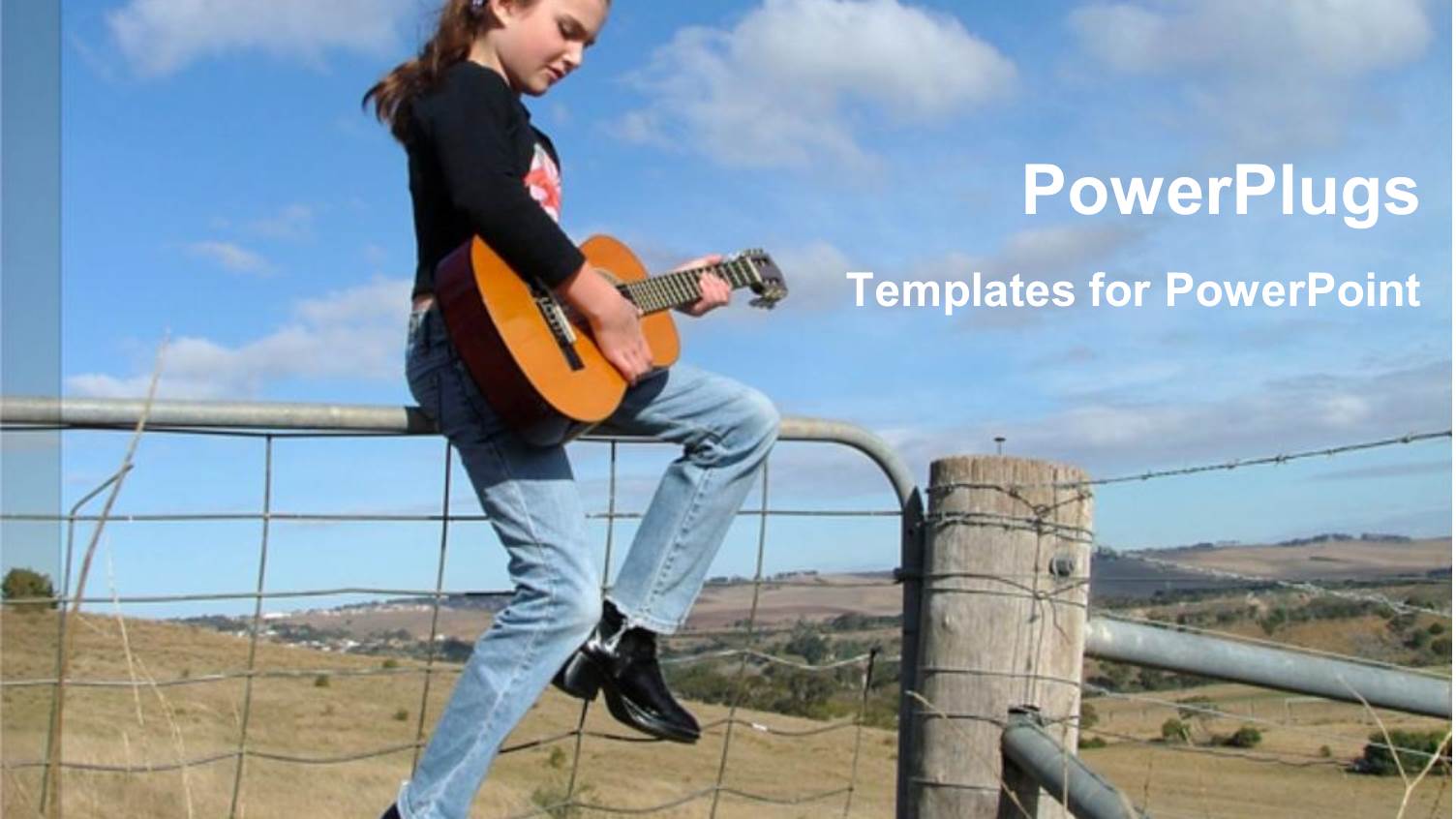 Young Girl Playing Guitar Sitting on Top of Fence in Countryside Scenery