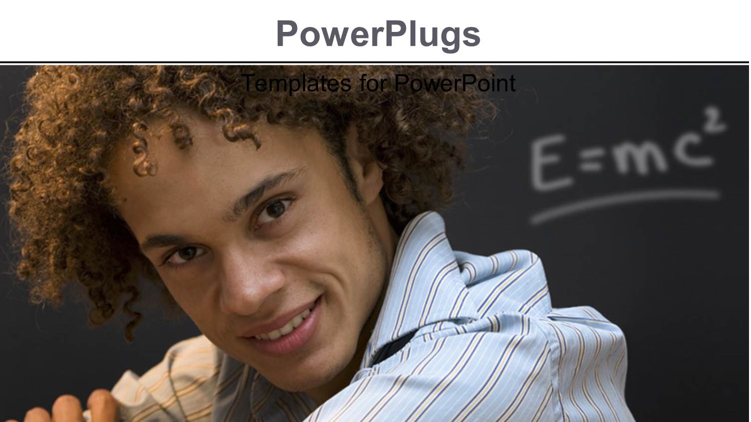 Young Smiling Man with Einstein's Relativity Formula on Chalkboard