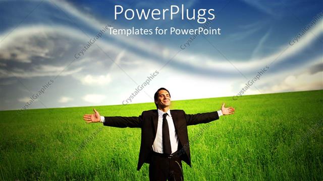  Presentation with grass - Business man standing in a grass field looking happy