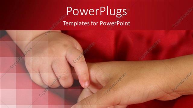  Presentation with siblings - Close up of baby holding older siblings finger on red fabric