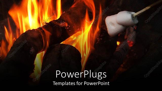  Presentation with camp - A close up view of a camp fire with flames and wood