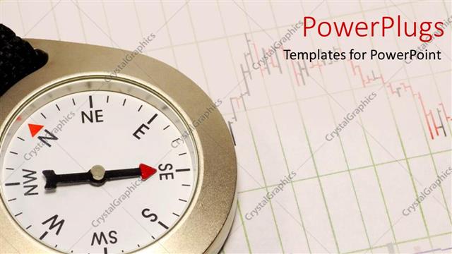  Presentation with direction - A compass with its arrow pointing south east on a graph paper