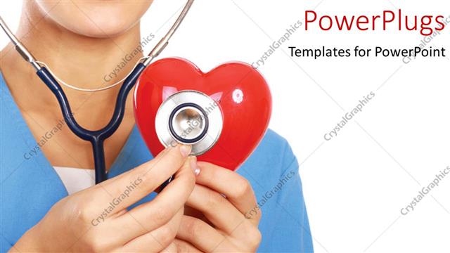  Presentation with plastic - A doctor checking  a plastic heart with a stethoscope