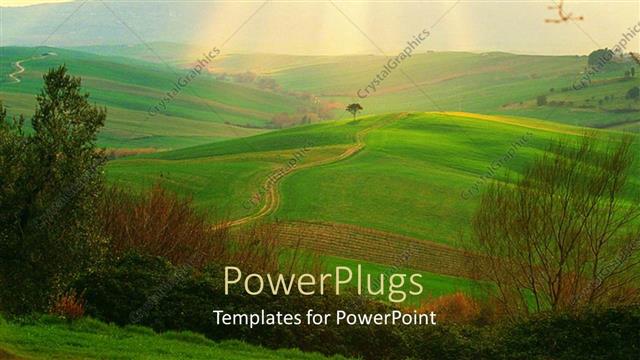  Presentation with horizon - Green fields of Campagna Toscana, Italy with sunlight rays in horizon