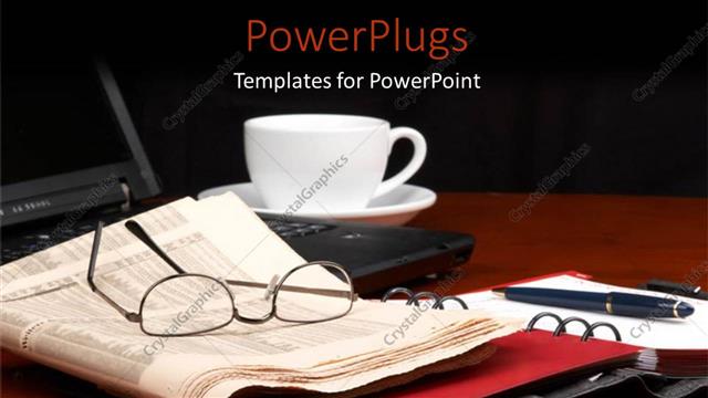  Presentation with office newspaper - A laptop with a pair of reading glasses on a newspaper