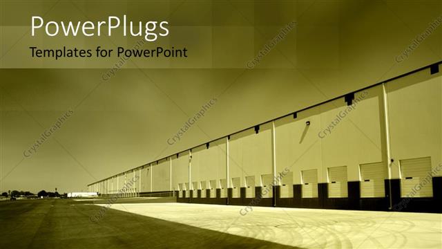  Presentation with warehouse - A large open field with a wide building on the right