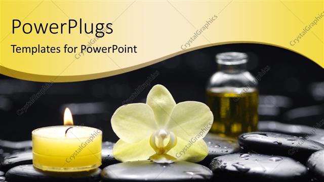  Presentation with water droplets - Lighted yellow candle and oil with water droplets on spa stones