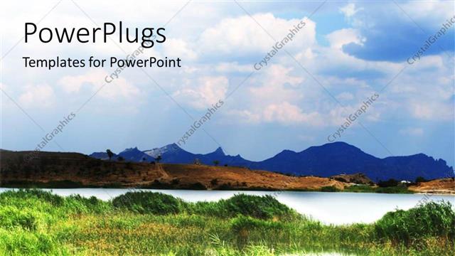  Presentation with field - An open grass field with mountains and a river