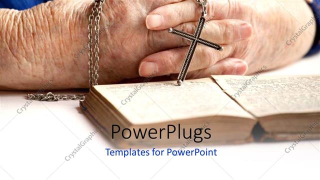  Presentation with cross - A pair of hands holding a rosary with an open book