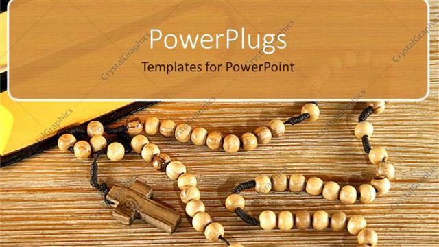  Presentation with rosary - Rosary with brown beads and wooden cross beside holy book