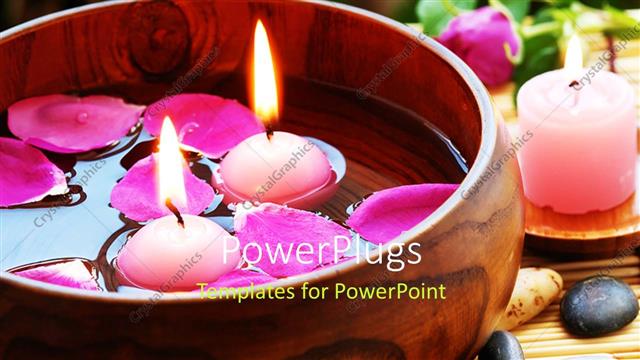 Presentation with aromatherapy - Rose petal aromatherapy in wooden bowl next to pink lighted candles