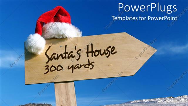  Presentation with santa - Sign pointing way to Santa's house with snowy background and clear blue sky