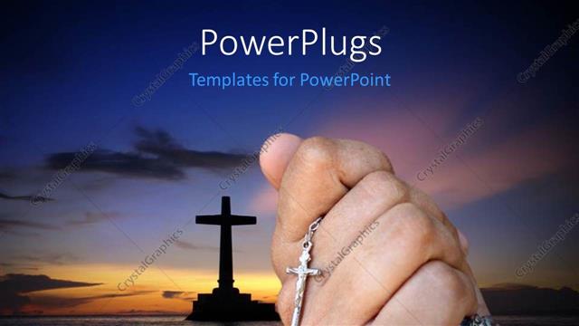  Presentation with rosary - Sun set view of a closed hand holding a rosary