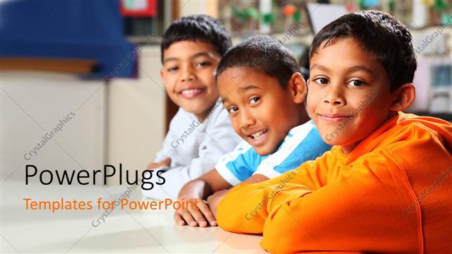  Presentation with room - Three male kids sitting and smiling in a class room setting