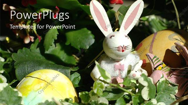  Presentation with bunny - A toy easter bunny with two cracked easter eggs?