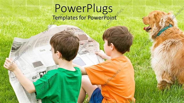  Presentation with dog - Two boys sitting in the grass reading a newspaper together with their dog