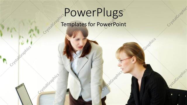  Presentation with females - Two females having a conversation while looking at laptop