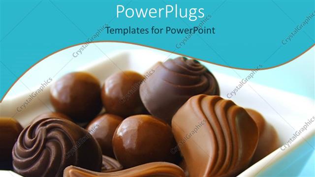  Presentation with chocolate - Various chocolate balls and chocolate candies in a bowl on light blue background