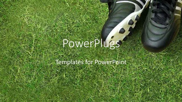  Presentation with grass - White and black colored sport boots with spikes on grass